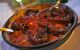 close up of cooked octopus in a bowl