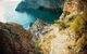 gravel path down a rocky cliff face