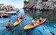 two kayaks starting off from the staging point