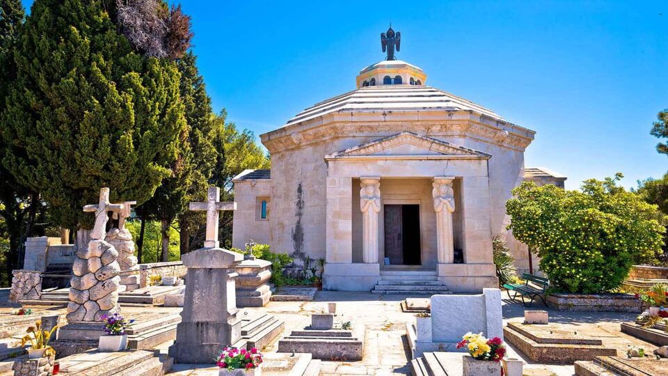 avtat graveyard and The Racic Mausoleum view, southern Dalmatia region of Croatia. Carved by famous late croatian sculptor Ivan Mestrovic.