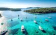 Aerial view of Paklinski Islands in Hvar, Croatia. Turquise water bays with luxury yachts and sailing boats.