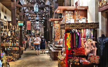 People shop at Souk Madinat Jumeirah in Dubai. The traditional Arab style bazaar is part of Madinat Jumeirah resort.