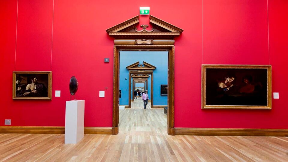 Interior gallery with bright red walls