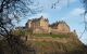 View of the west defences and hospital of Edinburgh Castle from the public gardens by The Parish Church of St Cuthbert