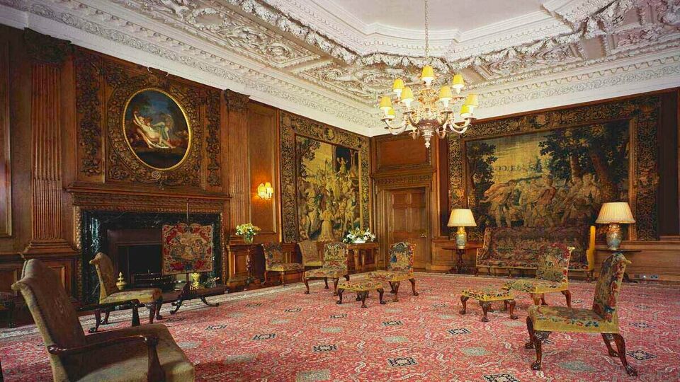 ornate reception rooms with some seating