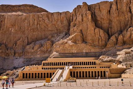Tourists visiting the ancient ruins of the Mortuary Temple of Hatshepsut in Luxor, Egypt