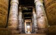 Huge carved columns at the main hall in the Temple of Seti I in Abydos, El Balyana, Egypt