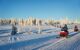 snowmobiles in wilderness landscapes in Finnish Lapland