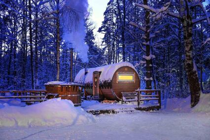 Small circular cabin in the woods