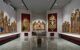 Exhibition room with religious masterpieces on the walls