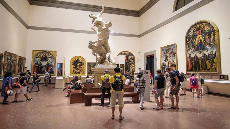 Visitors in entry hall of the Flroence Academy of fine arts (Accademia di belle arti di Firenze)