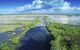 Aerial sunset view of Everglades swamp in Florida.