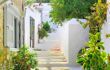 Narrow street with stairs leading to chorio on Hydra island, Greece
