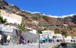 A view of the old port at Fira with small boats, dinghies and tour boats.