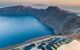 Mountainous narrow edge of the caldera, with blue water in the centre