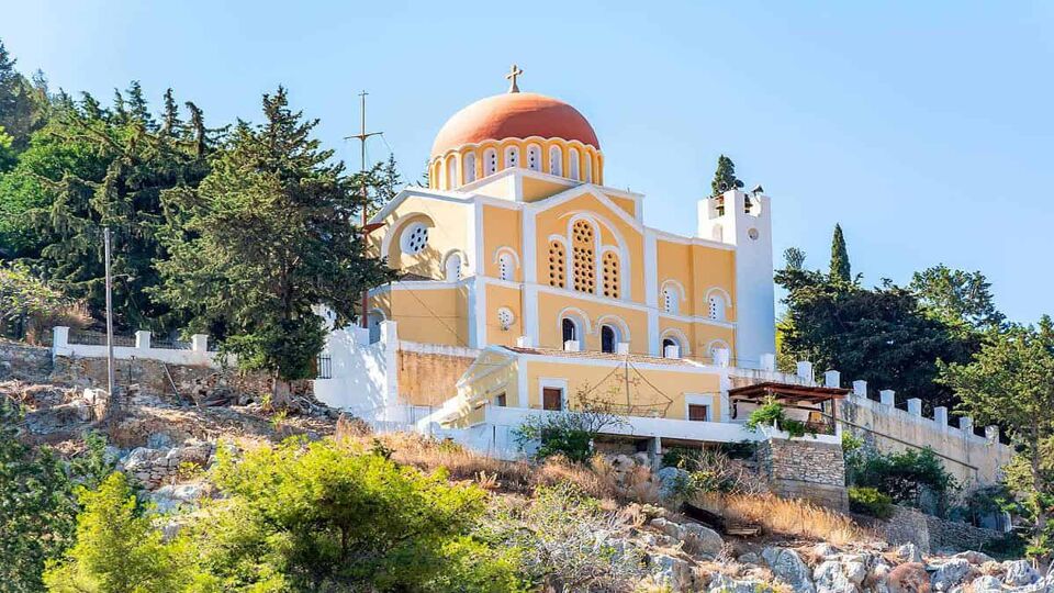 Traditional church over Symi town, Greece