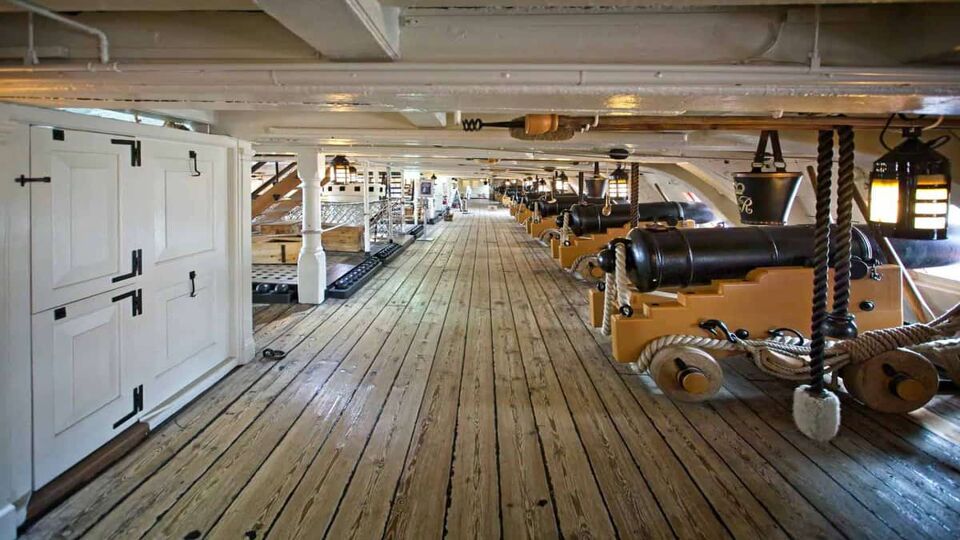 Rows of cannons in the gun deck on board HMS Victory, in Portsmouth Dockyard