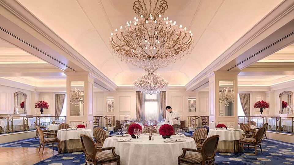 Extravagant chandelier above a dining area