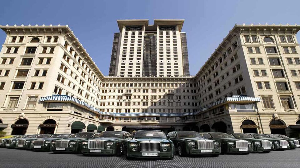 Fleet of Rolls Royces in front of the hotel