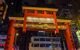 Large red and gold gate signposting Temple Street