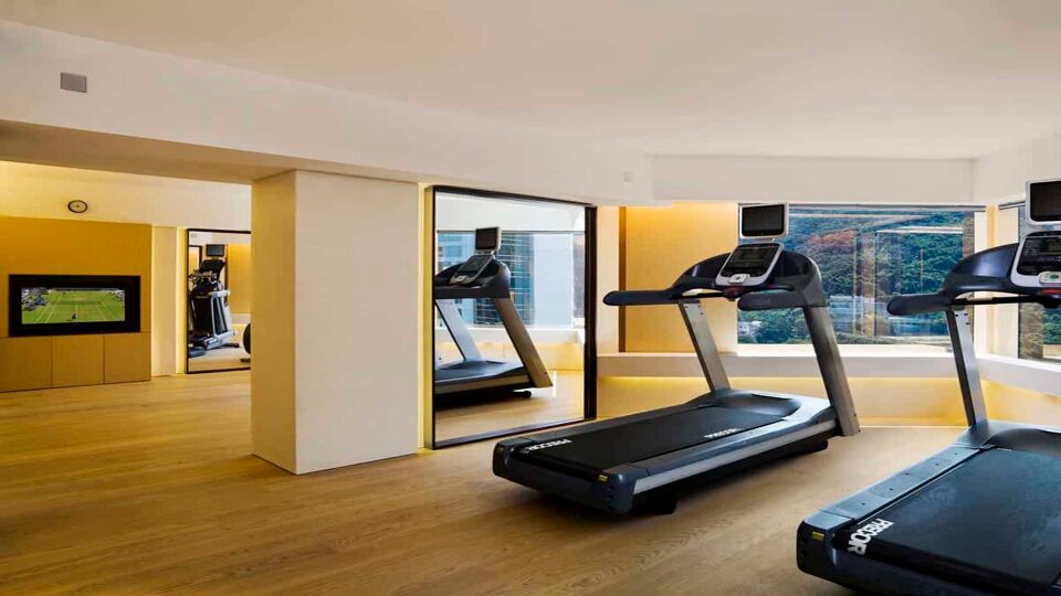 Treadmills lined up in the hotel's gym