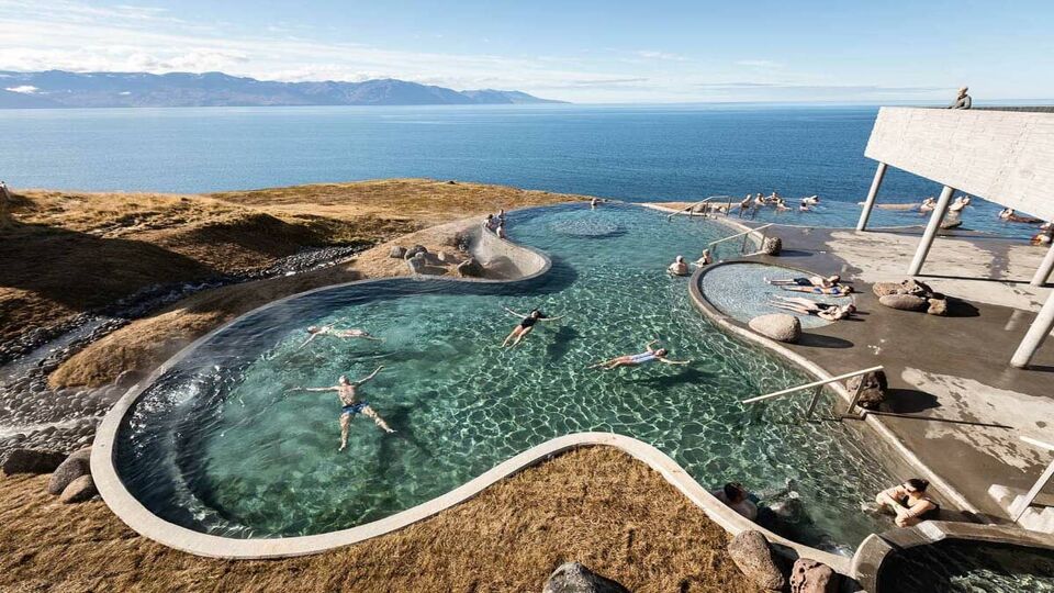 toruists soaking in the Geosea Geothermal Sea Bath