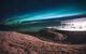 Geosea Geothermal Sea Bath at night with Northern Lights behind