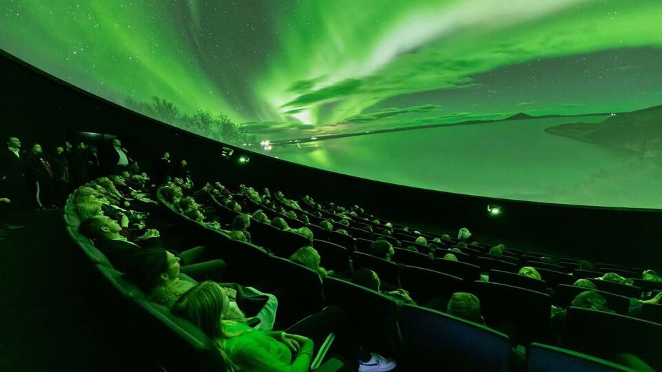 Visitors watching a movie in a 3d screen at the Perlan Museum in Reykjavik