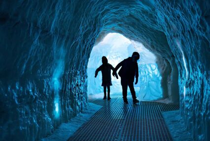 Two children in a ice cave at the Perlan Museum in Reykjavik