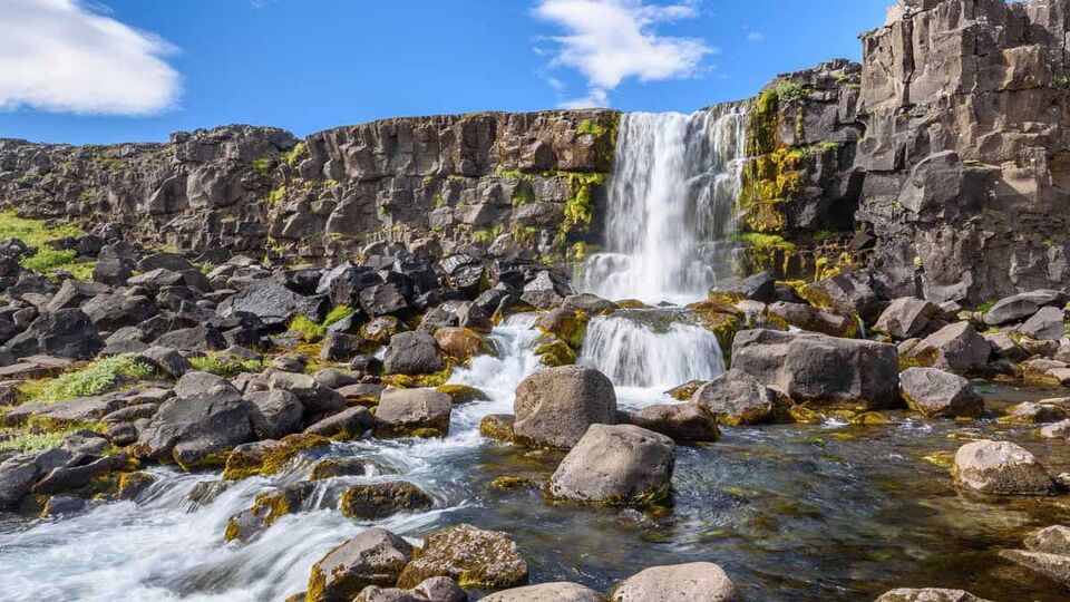 Beautiful Oxararfoss waterfall in summer, Thingvellir National Park, Iceland