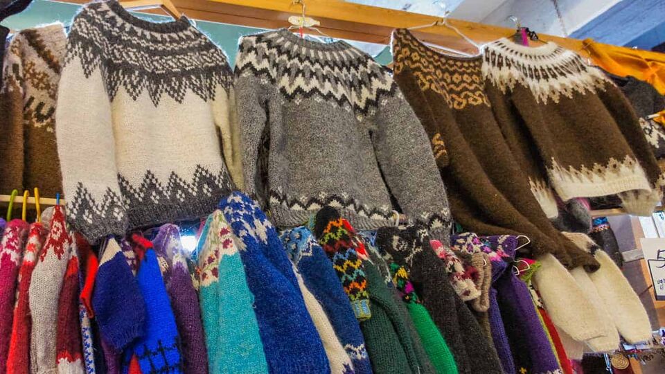 traditional icelandic 'Lopapeysa' sweater for sale in a market