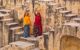 Two local women on the steps of the well