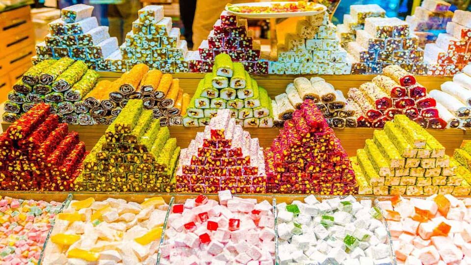Piles of multi-coloured Turkish delight confectionary in store front