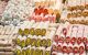 Brightly-coloured Turkish delights stacked in piles outside of a store