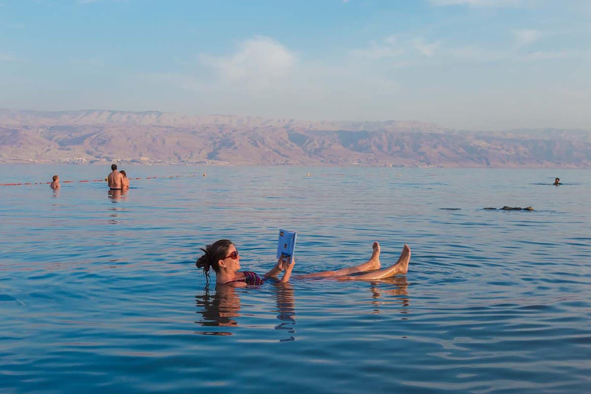 woman floating in the Dead Sea
