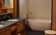 bathtub and two sinks in hotel ensuite