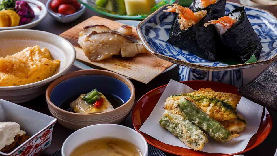 Plates of various Japanese dishes