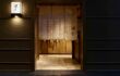 Lantern by traditional Japanese doorway