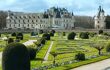 Landscaped gardens in foreground, chateau in background