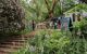 Small cafe in the grounds, shaded by a large tree