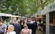 A packed market on a sunny day