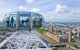 People in one of the pods looking over London during the daytime