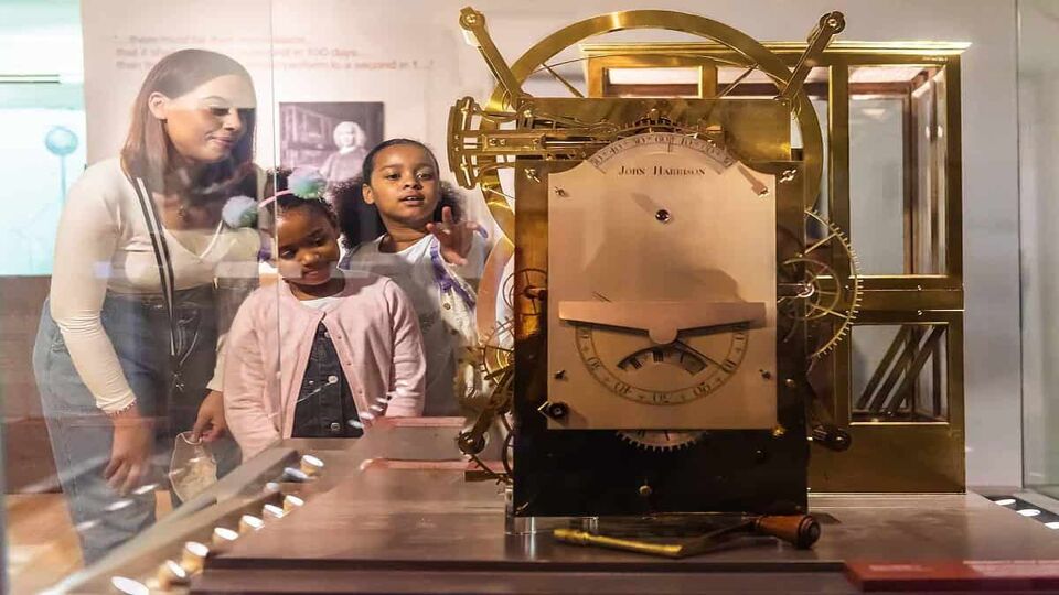 Children looking at science exhibits in the Royal Observatory Greenwich