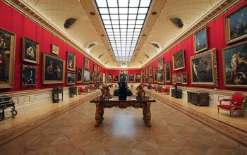 Main display gallery in the Wallace Collection Museum displaying fine art paintings on the walls