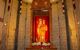 Close up of a religious statue in a lighted alcove