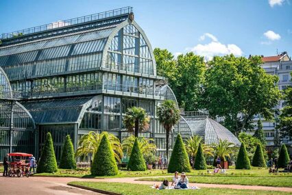 View of a large greenhouse in the Tete d'Or Park in Lyon