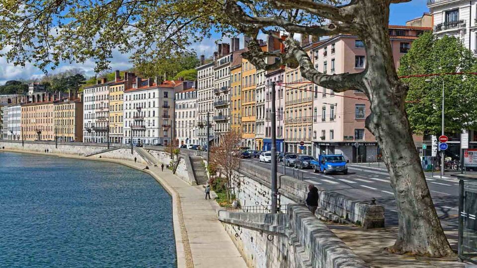 A spring day on the Saone river banks in Lyon city center, looking along the quay