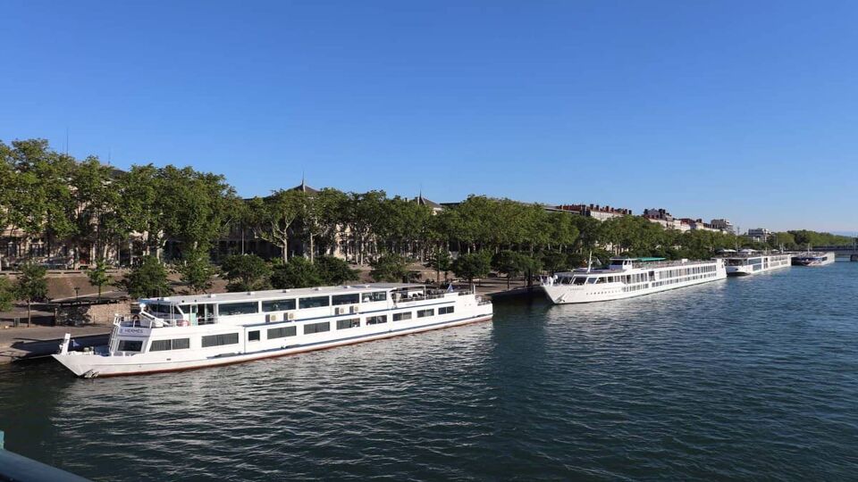 boats moored at the Claude Bernard quay in Lyon on the banks of the Rhône river, city of Lyon