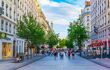 People are strolling through rue de la republique in the historical center of Lyon, France