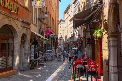 Vieux Lyon old district pedestrian street view in Lyon France during summer with tourists